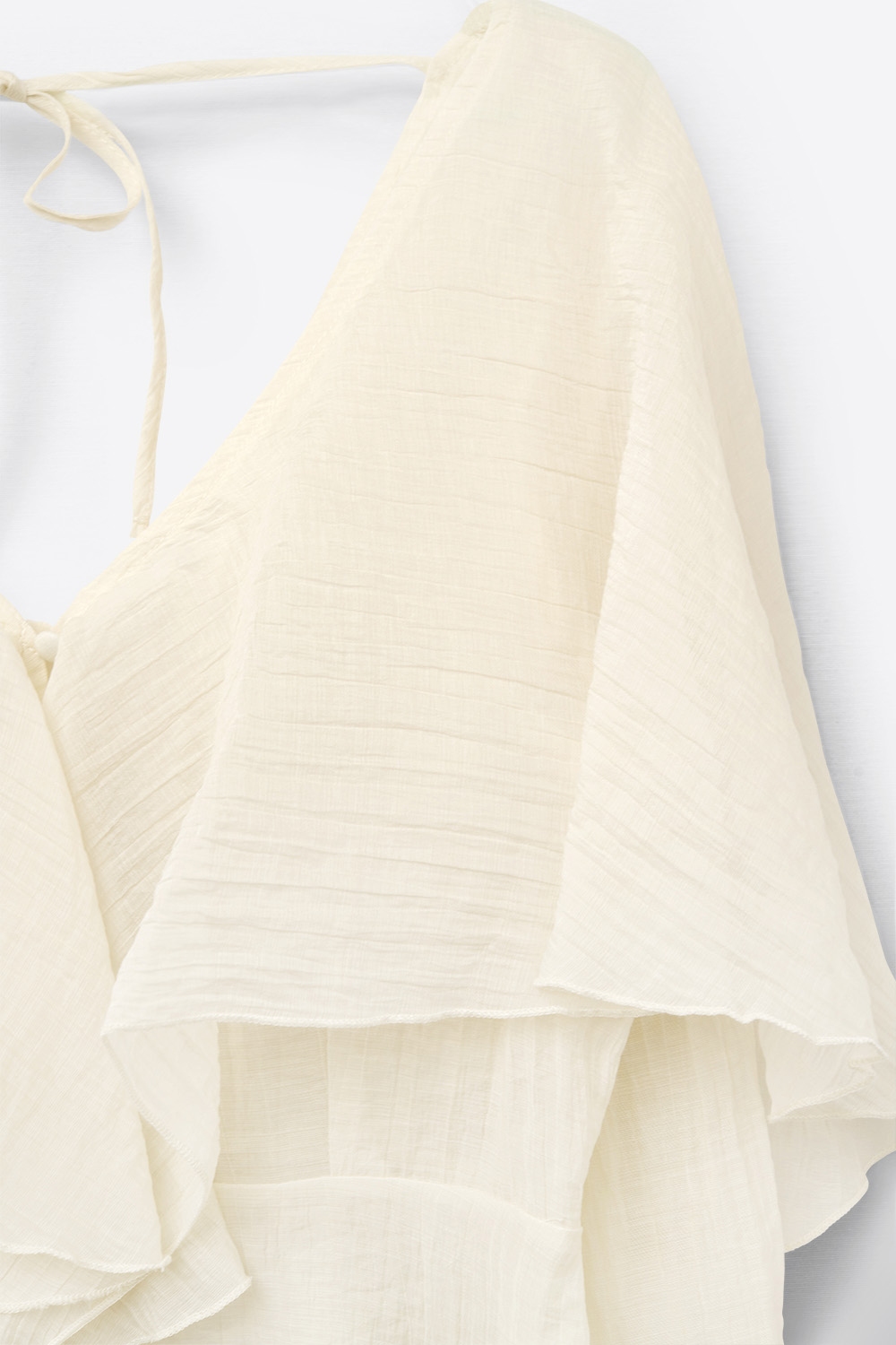 blusa corta de gasa fluida con mangas largas blusa corta de gasa fluida con mangas largas