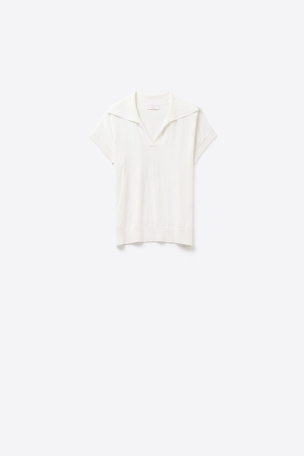 Polo de punto fino de manga corta en blanco