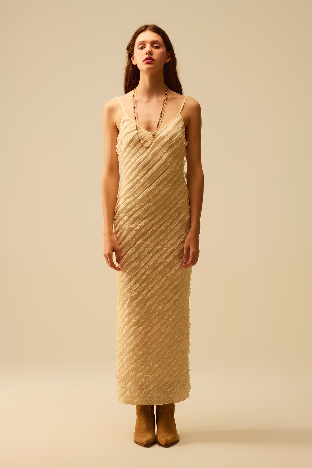 Maxi vestido crudo con flecos y tirantes