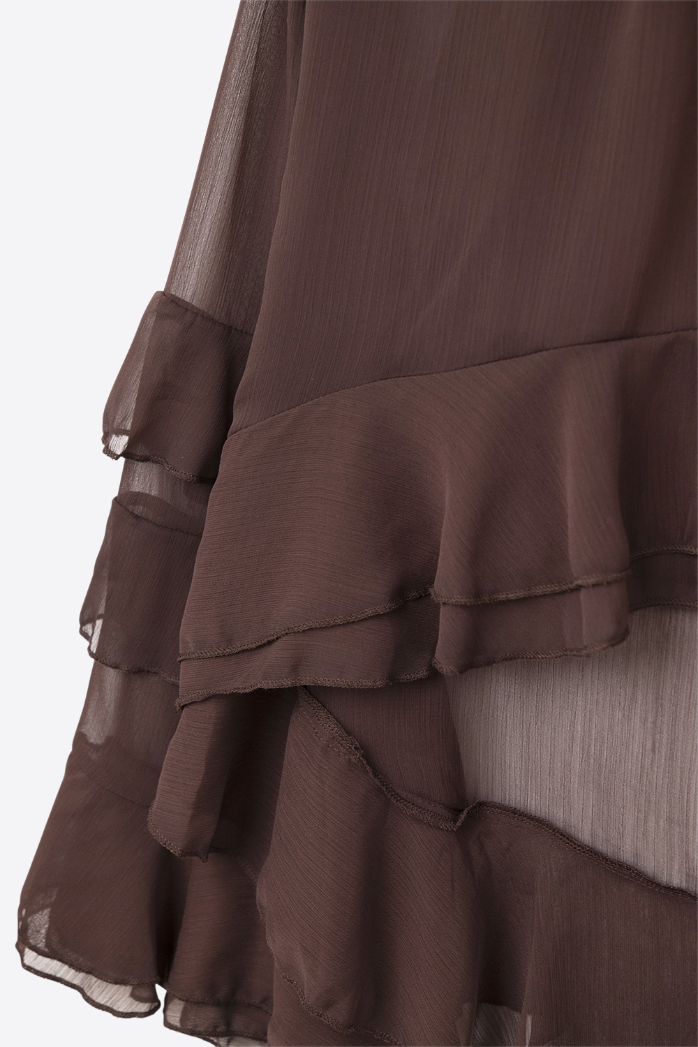 Blusa marr&oacute;n de gasa con volantes y transparencias