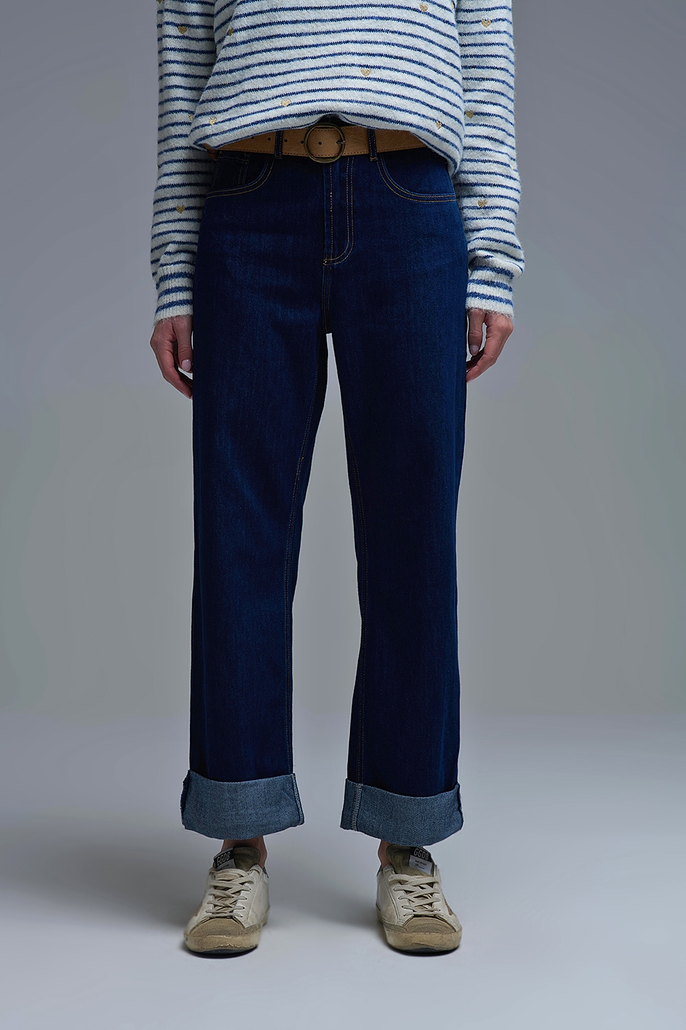 Vaqueros de talle alto y pernera ancha en azul oscuro con dobladillo plegado Vaqueros de talle alto y pernera ancha en azul oscuro con dobladillo plegado