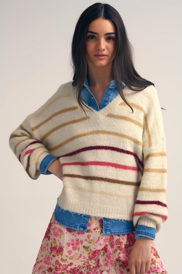Jersey oversize crema con raya multicolor