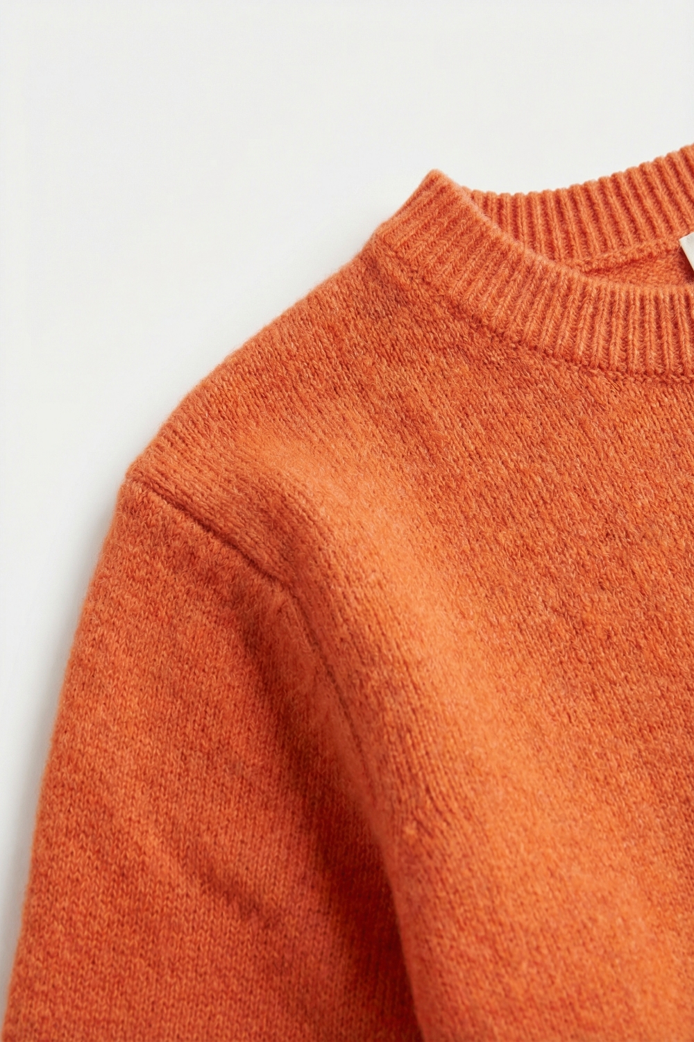 Jersey de punto suave y esponjoso naranja con detalle de mangas con volantes Jersey de punto suave y esponjoso naranja con detalle de mangas con volantes
