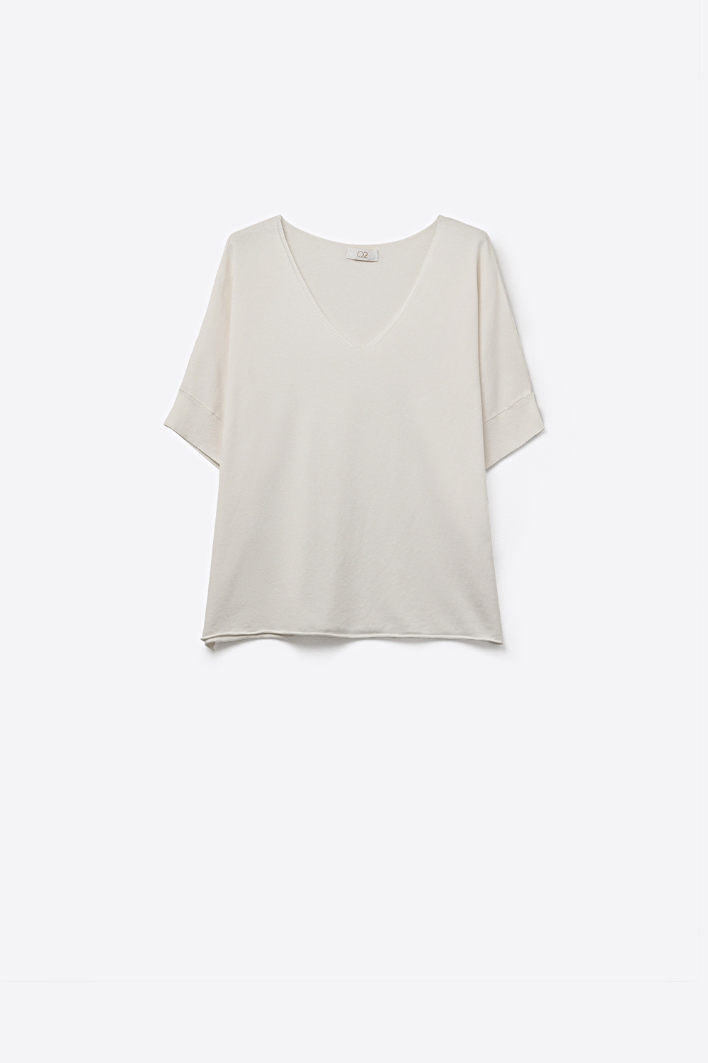 Jersey blanco de manga corta con cuello en V y corte relajado
