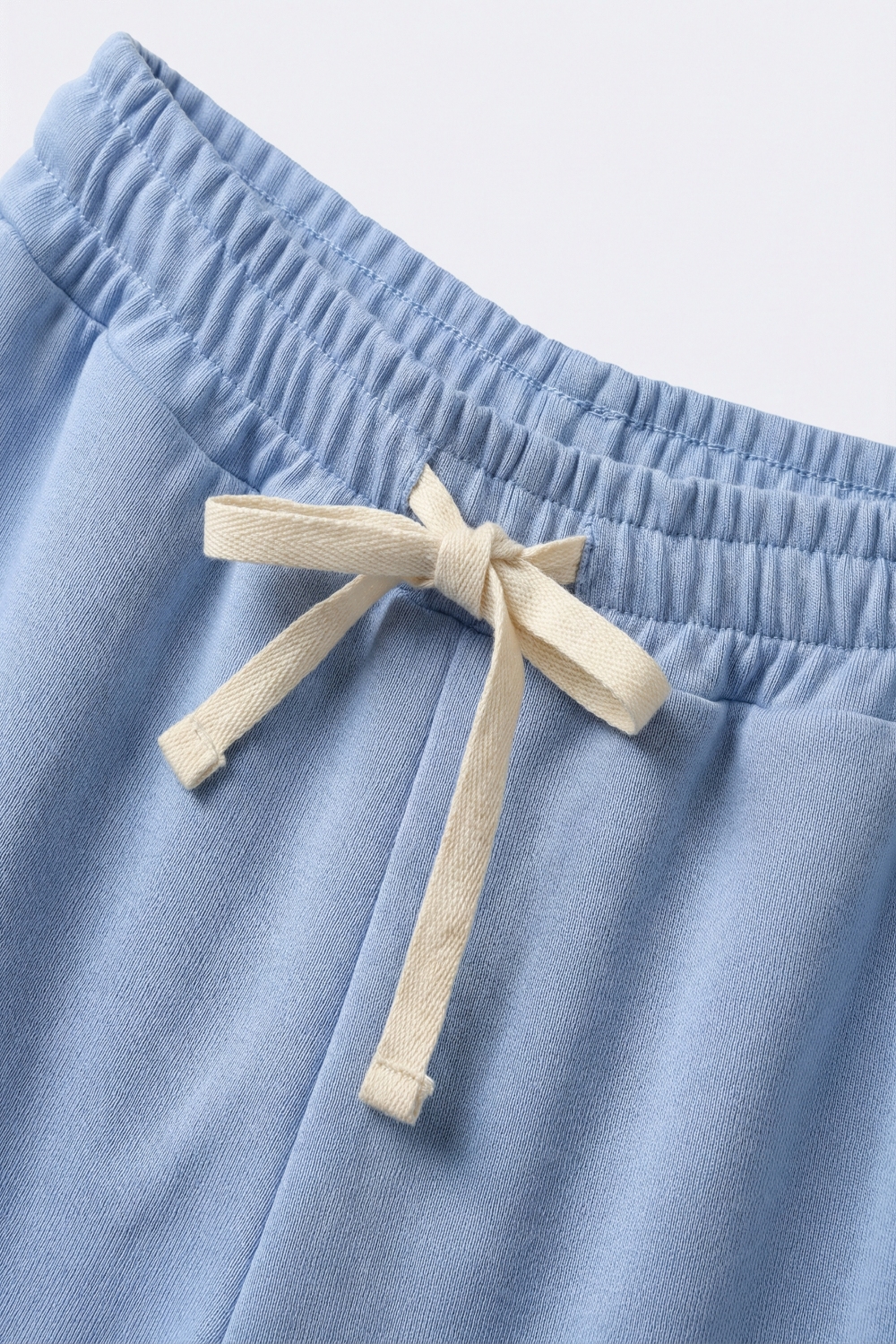 Pantal&oacute;n jogger de punto supersuave en azul con cintura con cord&oacute;n