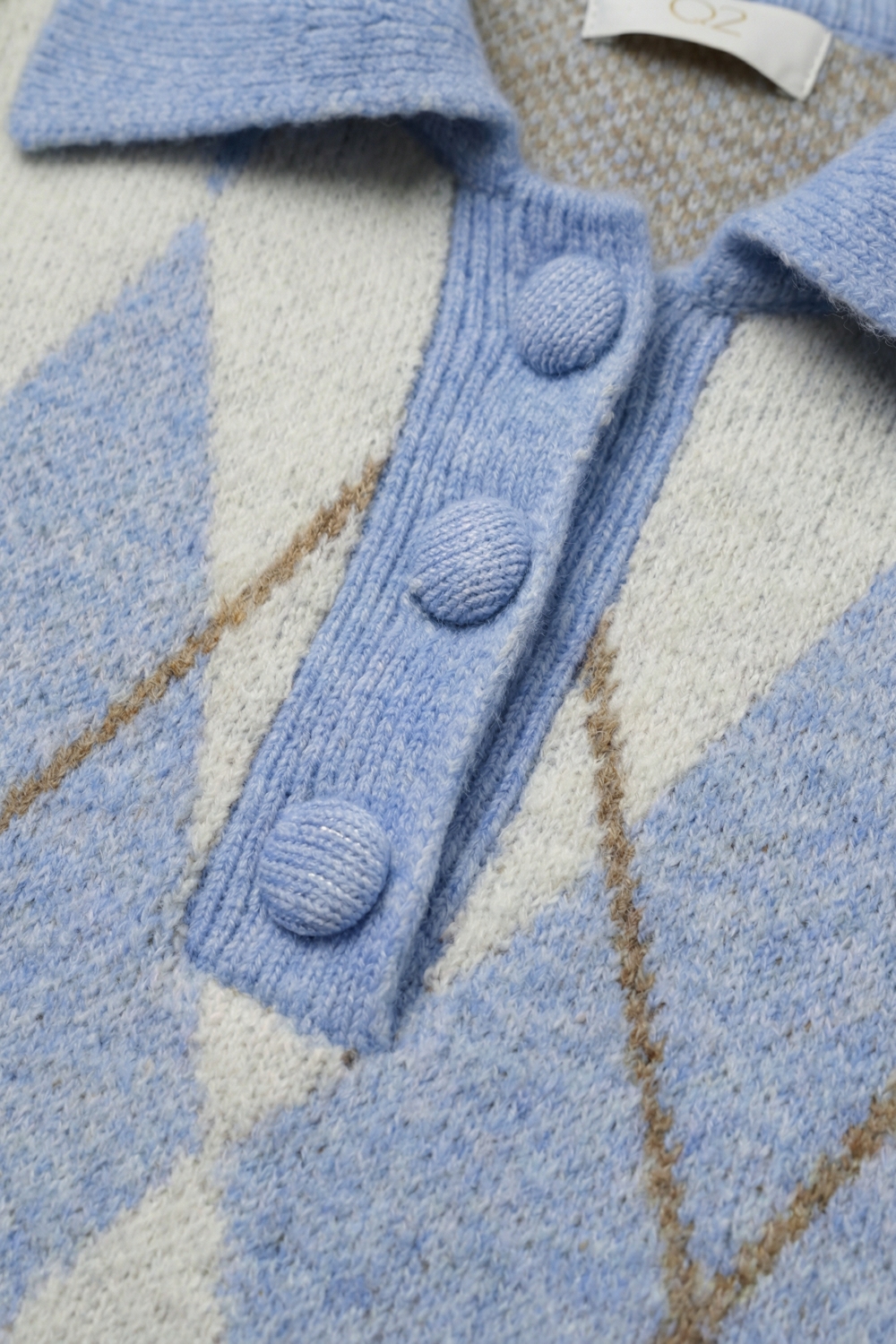 Jersey de punto de rombos en azul con cuello de polo Jersey de punto de rombos en azul con cuello de polo