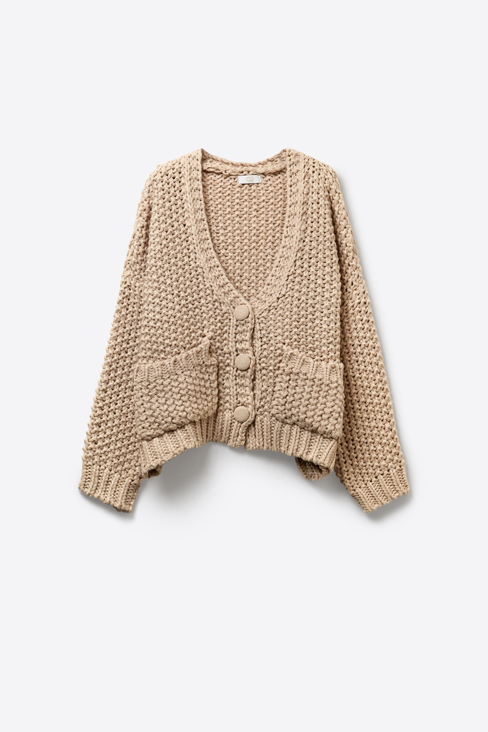 Chaqueta oversize de punto grueso con bolsillos en beige oscuro Chaqueta oversize de punto grueso con bolsillos en beige oscuro