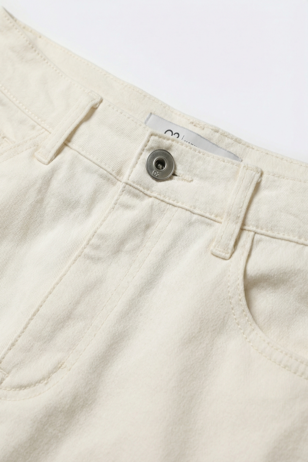 Pantalones de sarga de algodón elásticos de pierna extra ancha en color blanco Pantalones de sarga de algodón elásticos de pierna extra ancha en color blanco