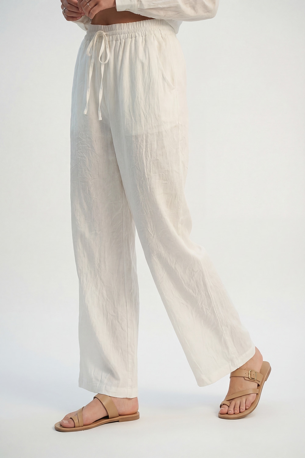 Crema Pantalones ligeros arrugados de pierna ancha con cintura elástica Crema Pantalones ligeros arrugados de pierna ancha con cintura elástica