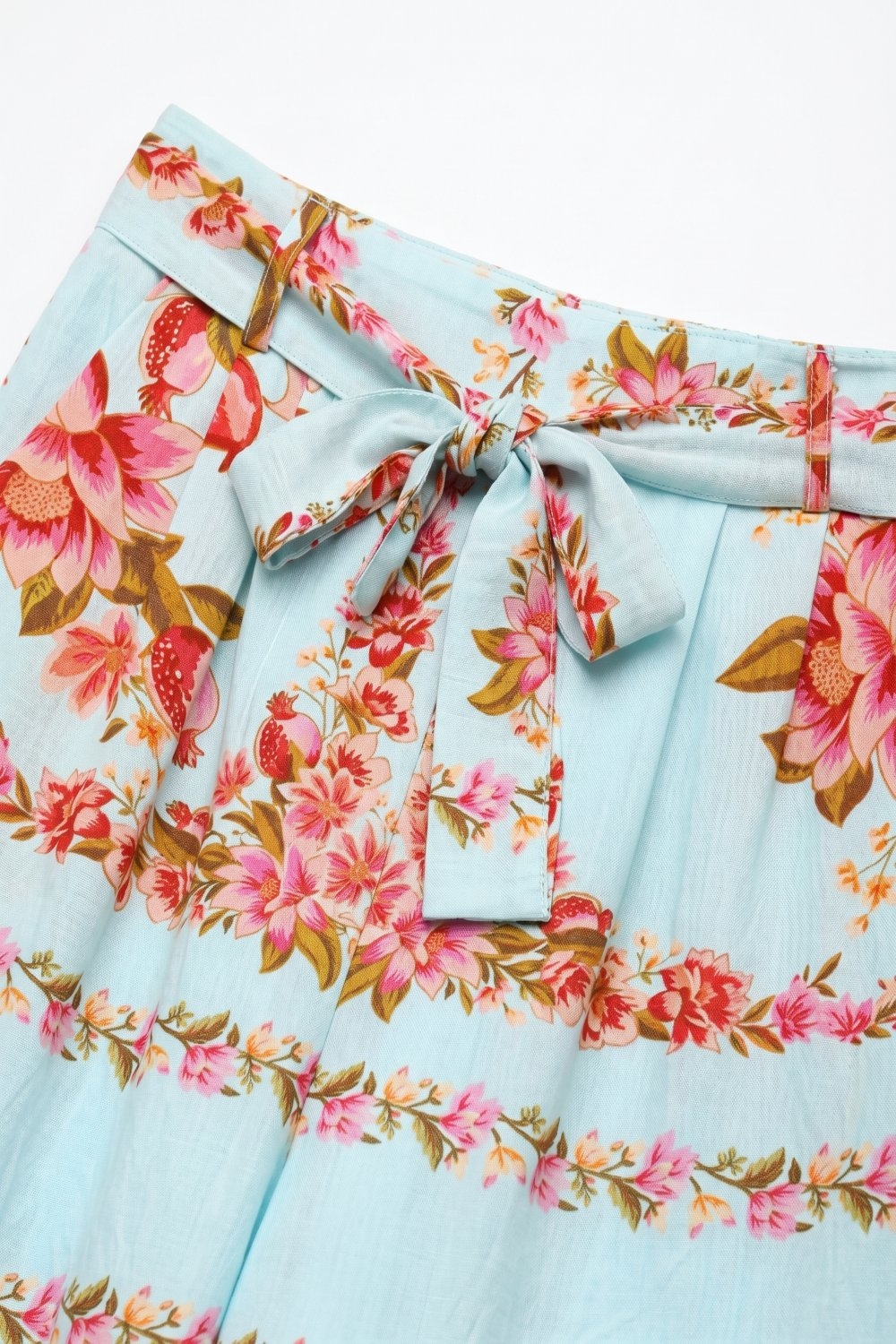 Pantalón pitillo de algodón con estampado floral azul claro Pantalón pitillo de algodón con estampado floral azul claro