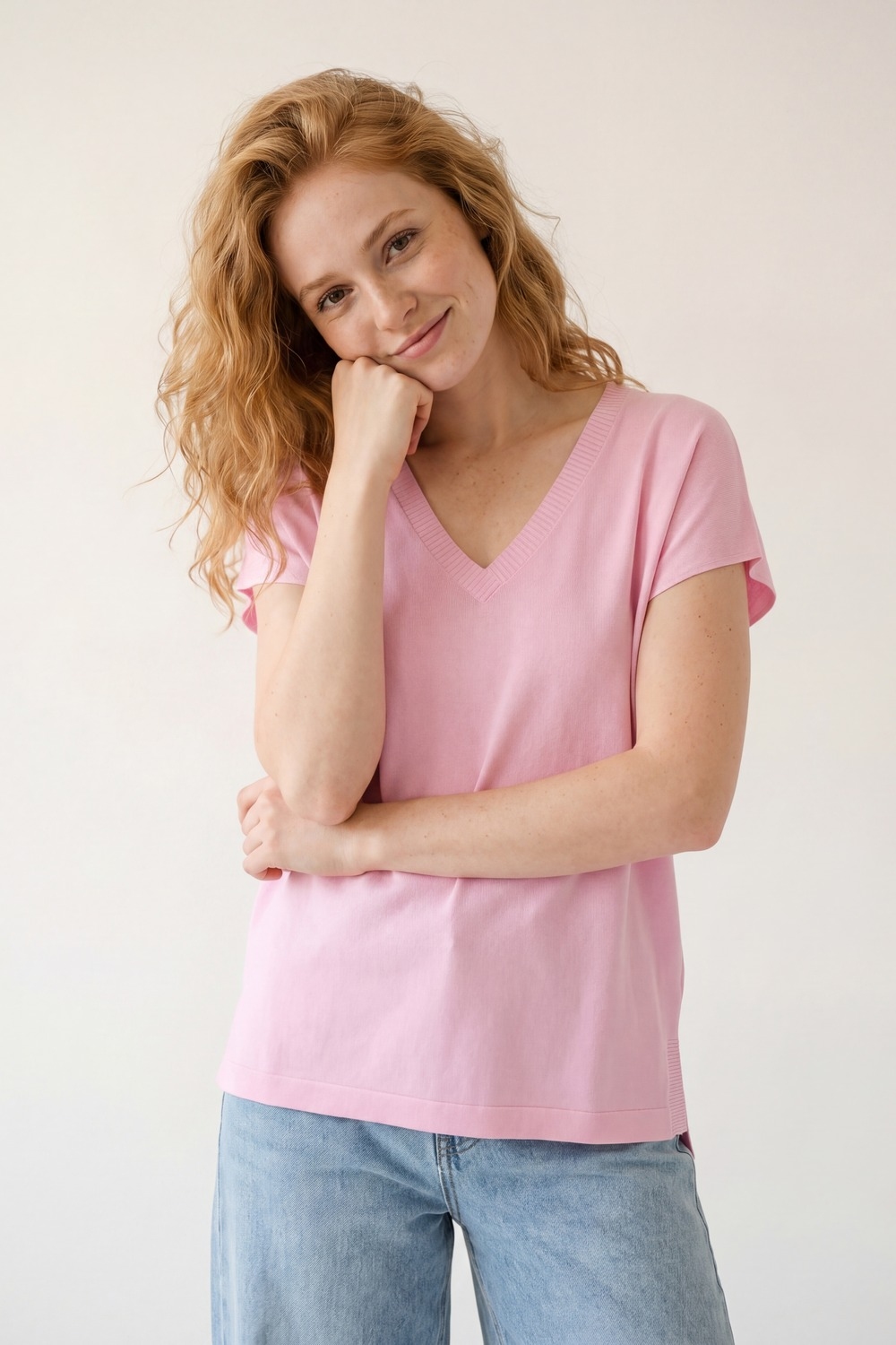Jersey de punto rosa de corte relajado y cuello en V