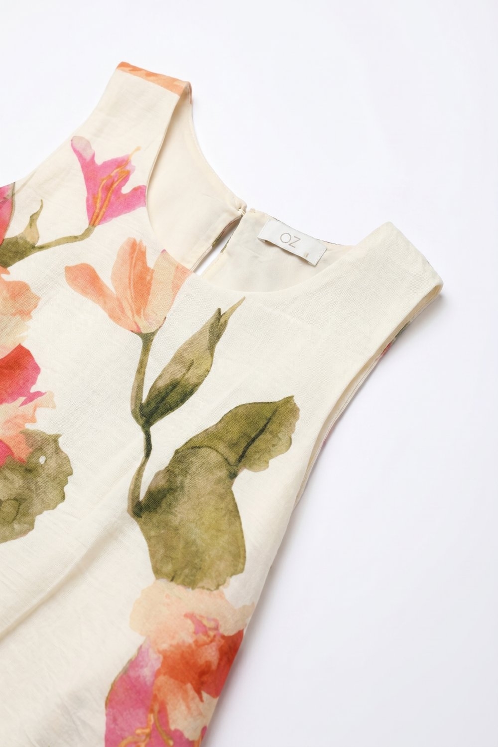 Top sin mangas con estampado floral crema Top sin mangas con estampado floral crema