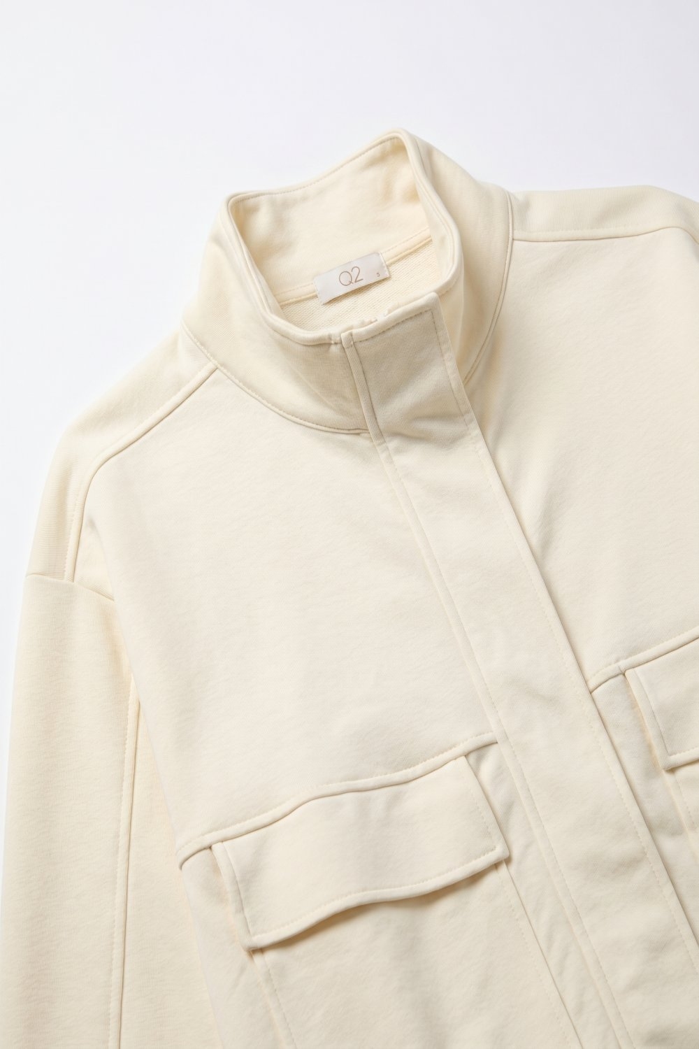 Chaqueta Bomber Relajada Con Bolsillo Frontal Y Cuello Alto De Viscosa Crema