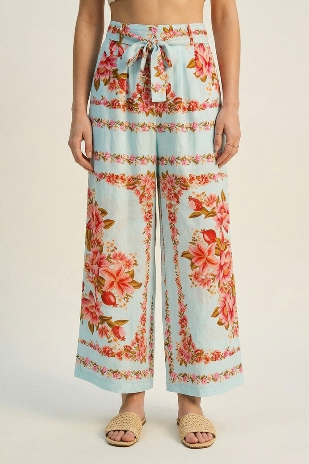 Pantalón pitillo de algodón con estampado floral azul claro Pantalón pitillo de algodón con estampado floral azul claro