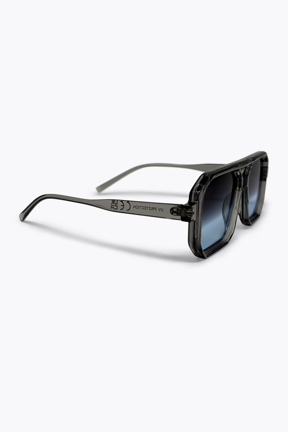 Gafas de sol geométricas de gran tamaño con montura transparente gris y degradado Gafas de sol geométricas de gran tamaño con montura transparente gris y degradado