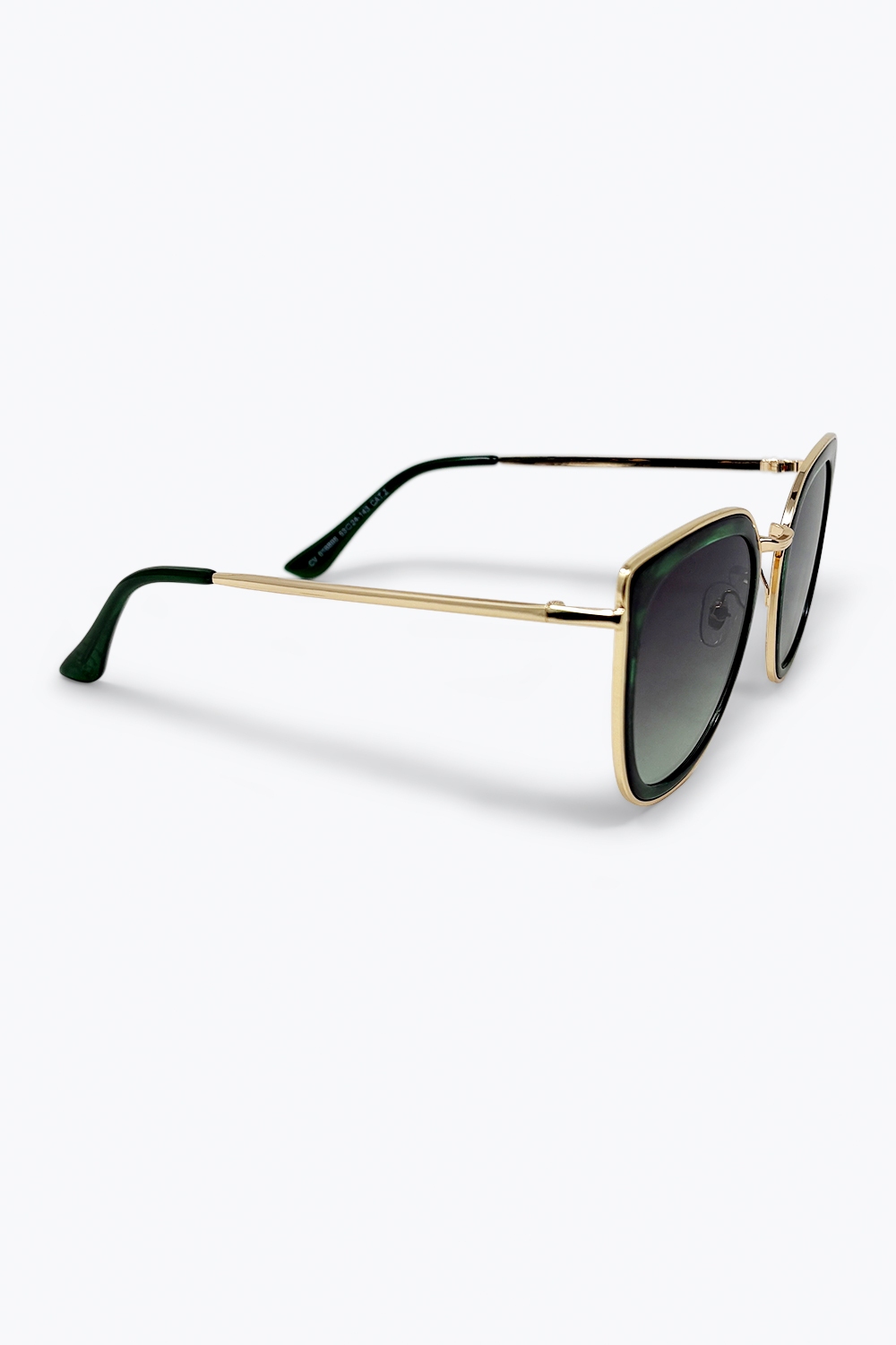 Gafas de sol con montura de metal y lentes degradados con efecto de m&aacute;rmol verde