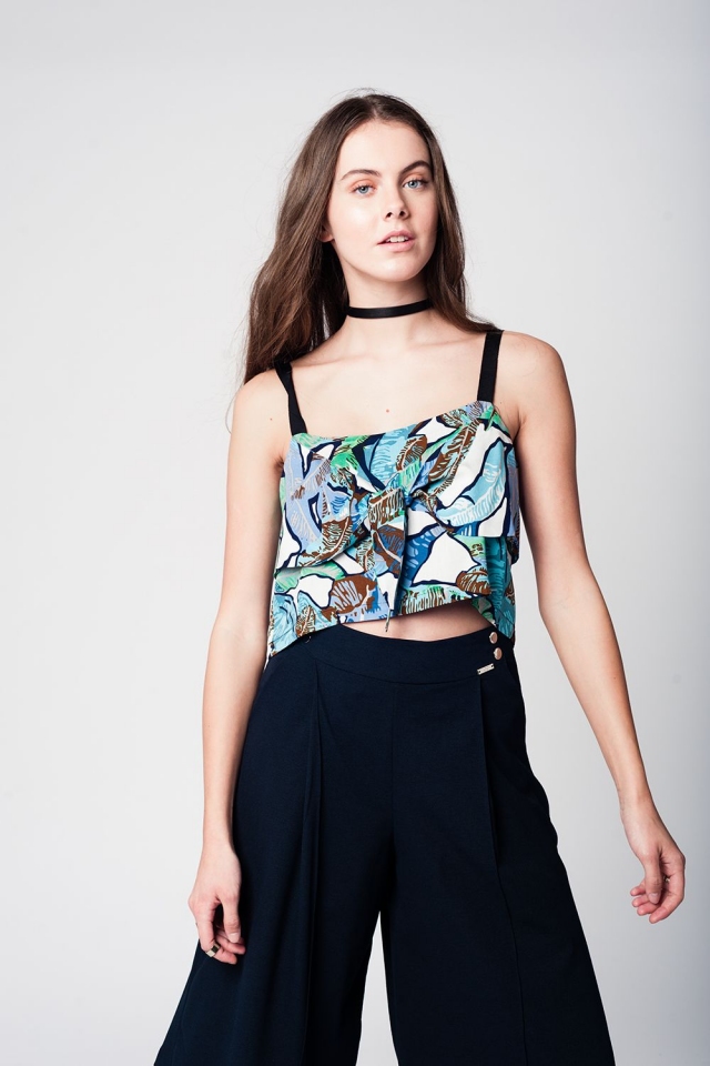 Blue crop top with leaves print and black straps