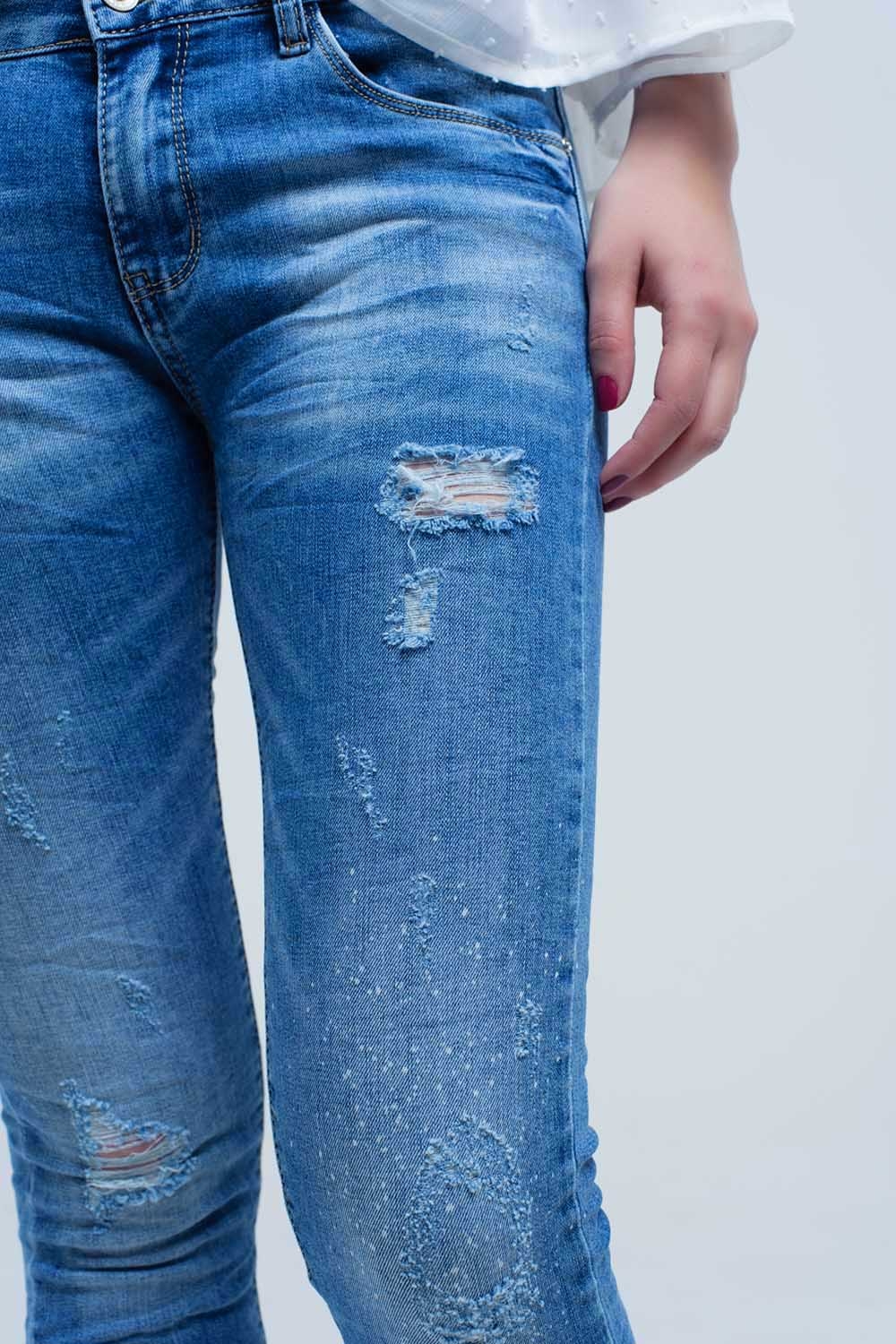 Jeans ajustados de tiro medio con roturas Jeans ajustados de tiro medio con roturas