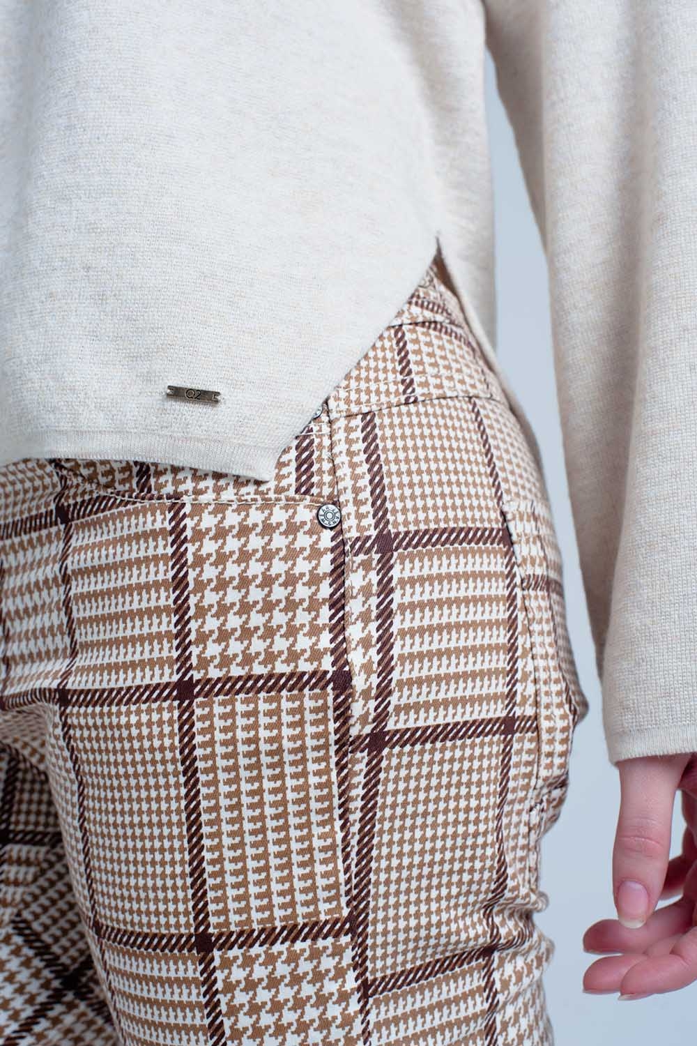 Su&eacute;ter de punto fino beige con detalles brillo en la manga