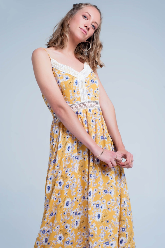 Yellow dress with flower print and crochet cut
