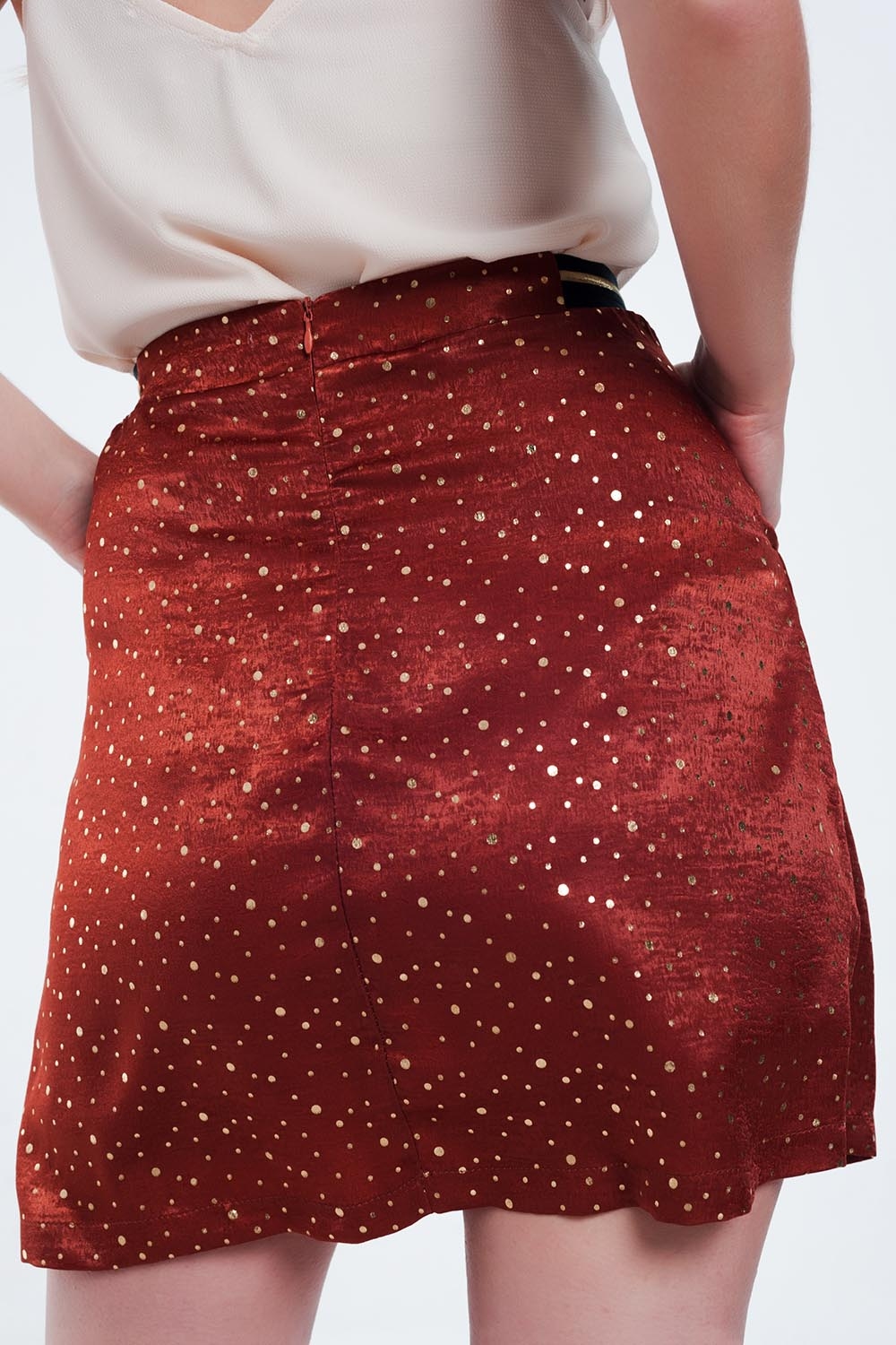 Minifalda caldera con pliegues y estampado de lunares Minifalda caldera con pliegues y estampado de lunares