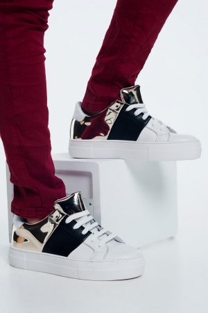 Chunky sneakers en negro y dorado