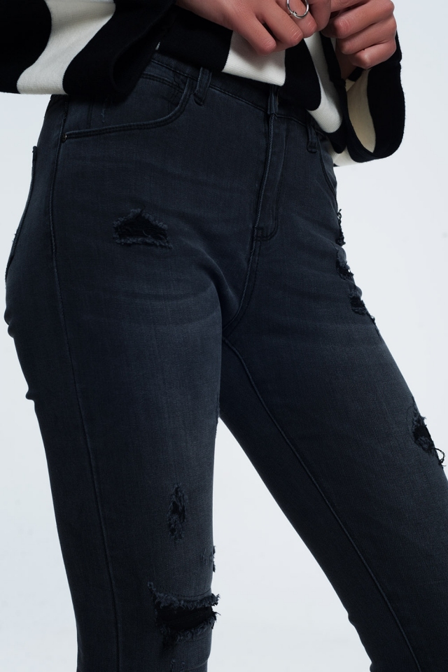 Gescheurde skinny jeans in zwart