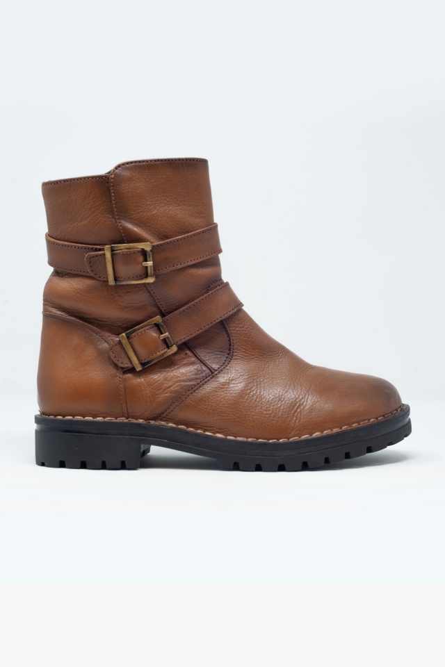 Brown buckled boots