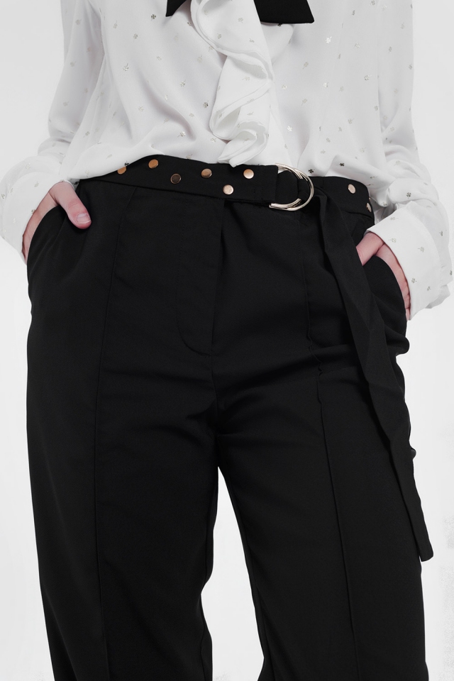 Pantalones con cinturón en negro