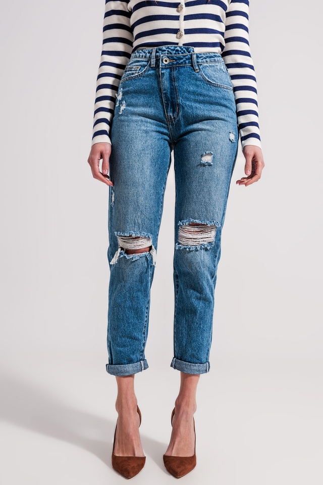 Jeans en asymmetrische knopen in middenblauw