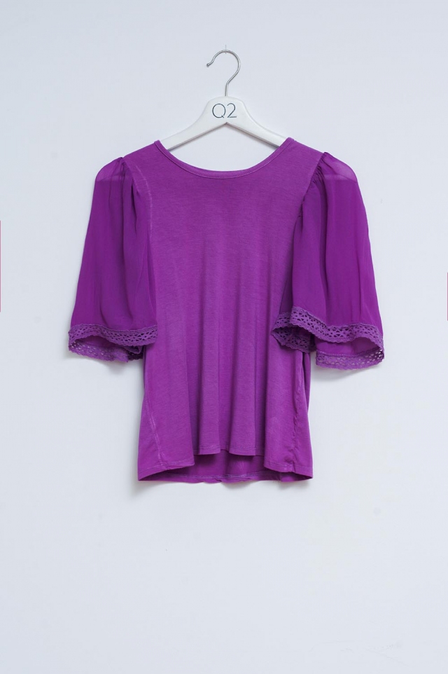 Freizeitbluse in Violett mit voluminösen Ärmeln