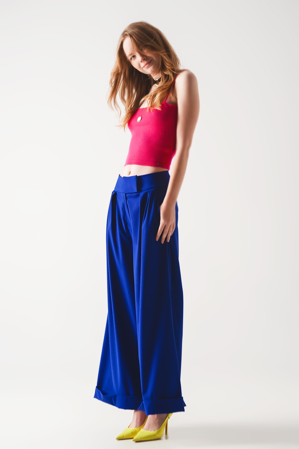 Top fucshia sin mangas de punto de canalé Top fucshia sin mangas de punto de canalé
