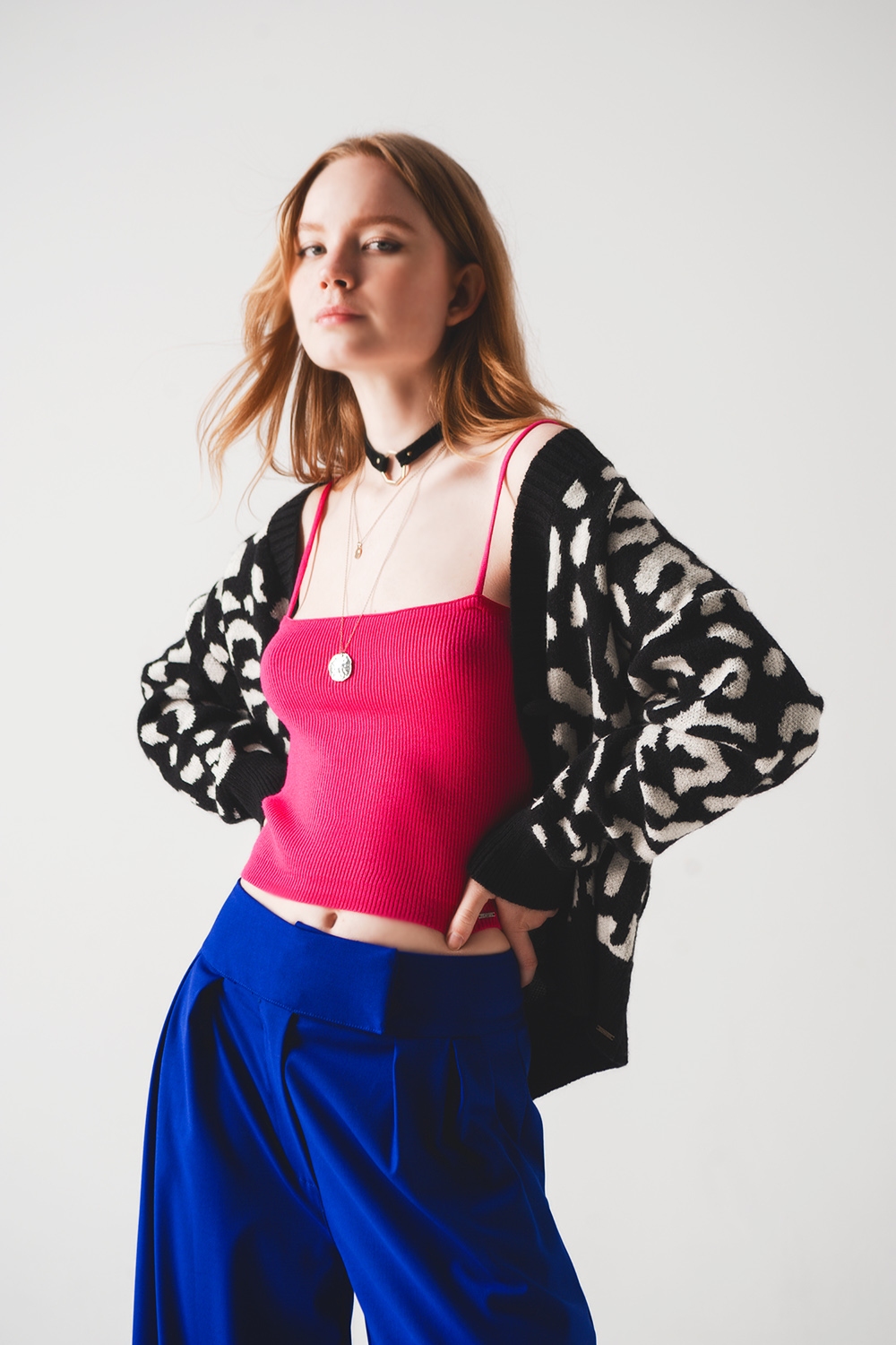 Top fucshia sin mangas de punto de canalé Top fucshia sin mangas de punto de canalé
