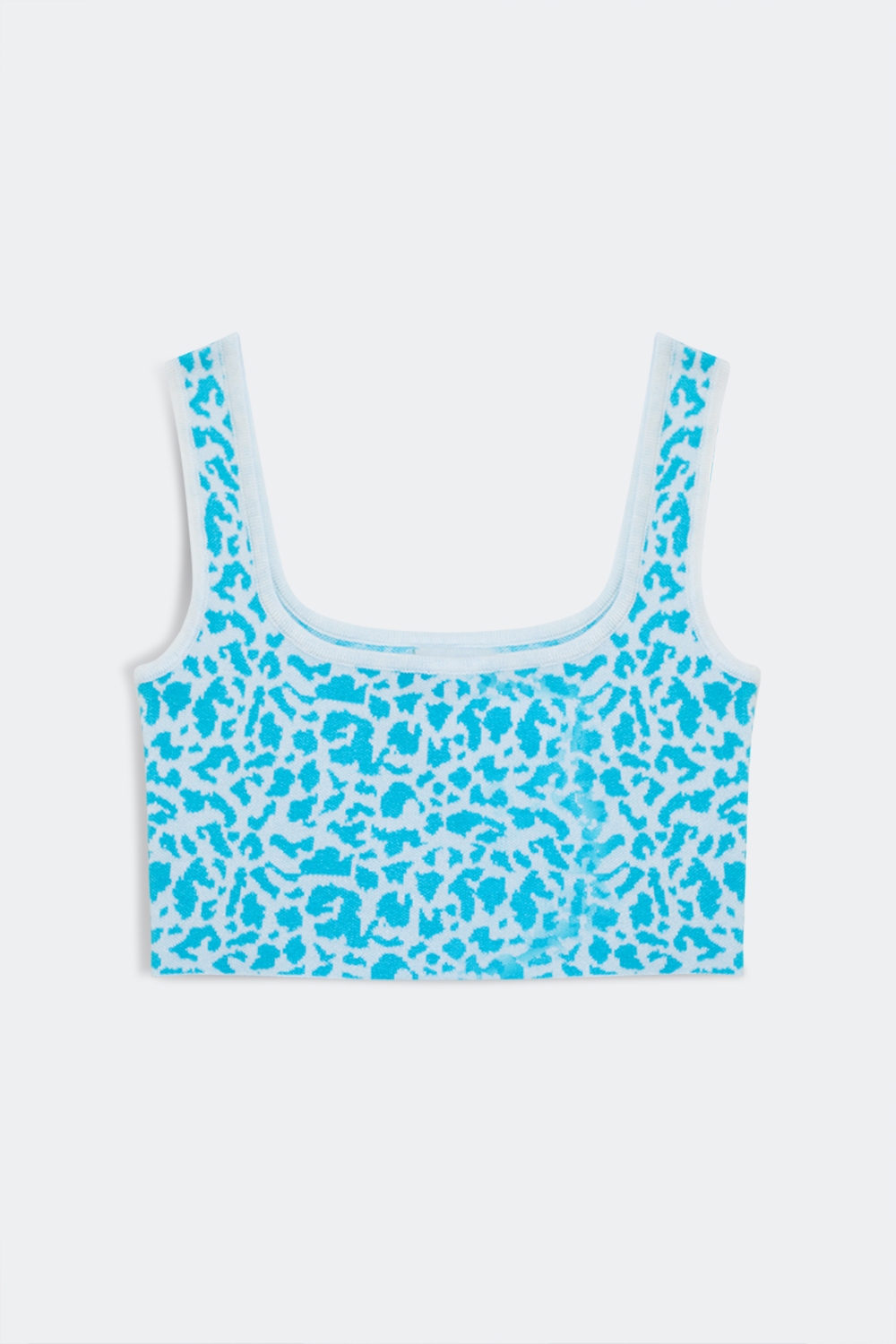 Top punto ligero en estampado animal turquesa Top punto ligero en estampado animal turquesa