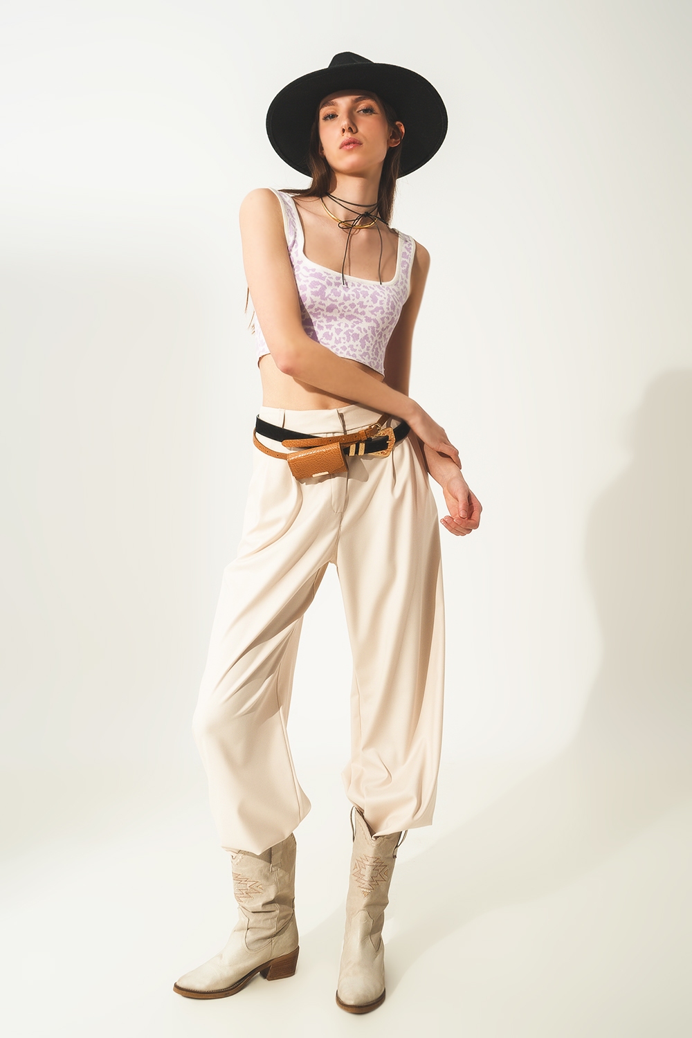Top punto ligero en estampado animal lila