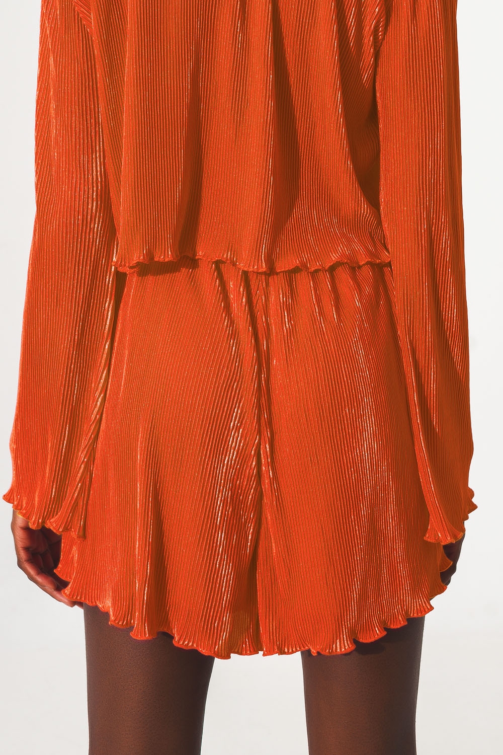 Shorts plisados en naranja Shorts plisados en naranja