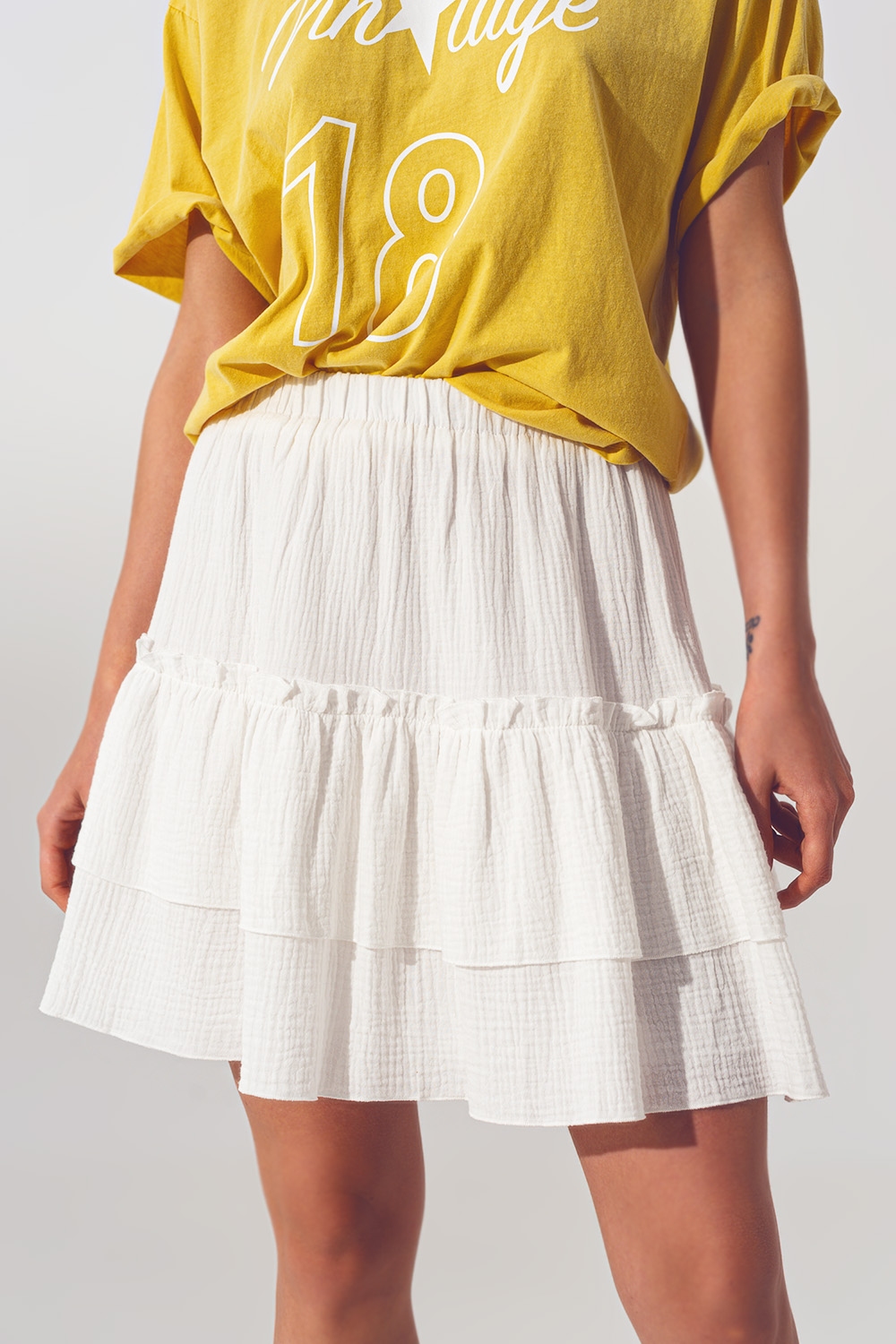 Minifalda con Volantes Texturizados en Blanco Minifalda con Volantes Texturizados en Blanco