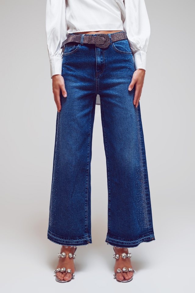 Jean à jambe large avec des détails en diamant sur le côté en toile délavée