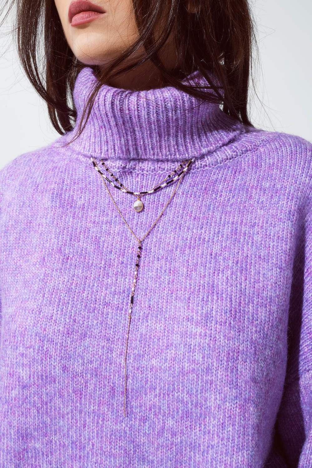 Collar 4 en 1 dorado con cuentas blancas y negras