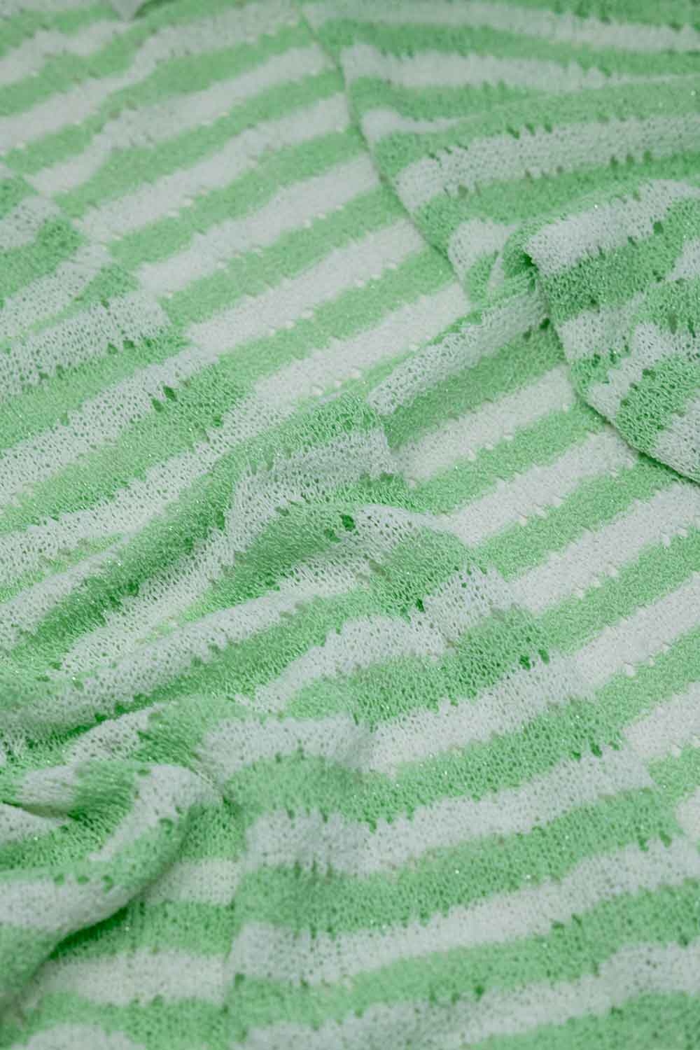 C&aacute;rdigan verde estilo boho con punto de pointelle a rayas y detalles de flecos