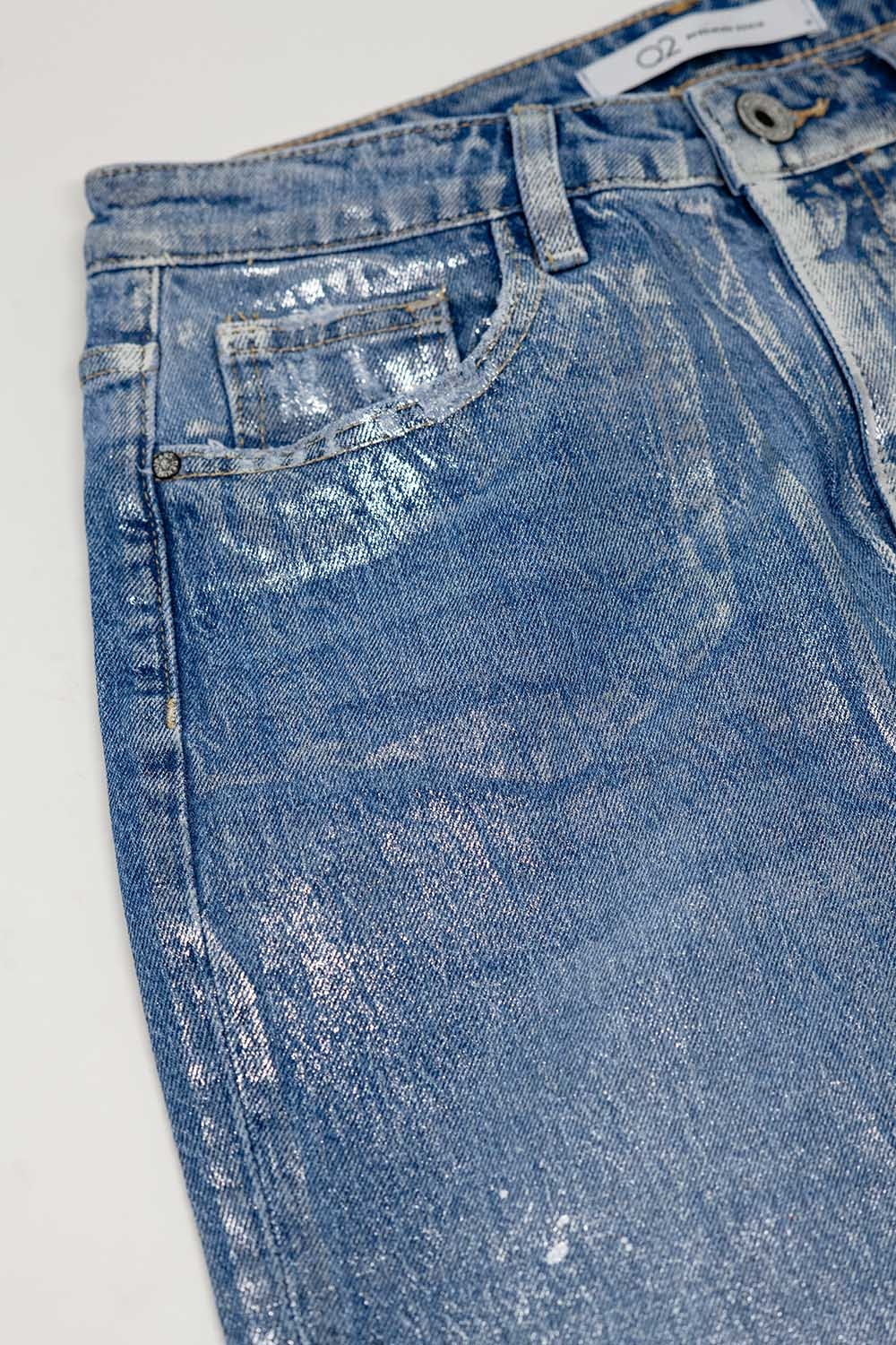 Vaqueros azules skinny con acabado metalizado en lavado claro Vaqueros azules skinny con acabado metalizado en lavado claro