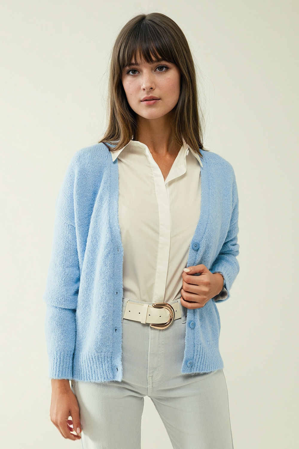 Chaqueta de punto azul con cuello de pico ancho y cierre de botones Chaqueta de punto azul con cuello de pico ancho y cierre de botones