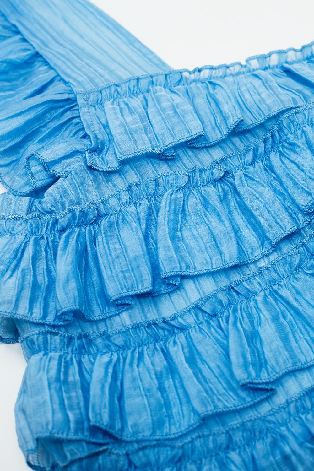 Top azul sin mangas con diseño fruncido Top azul sin mangas con diseño fruncido