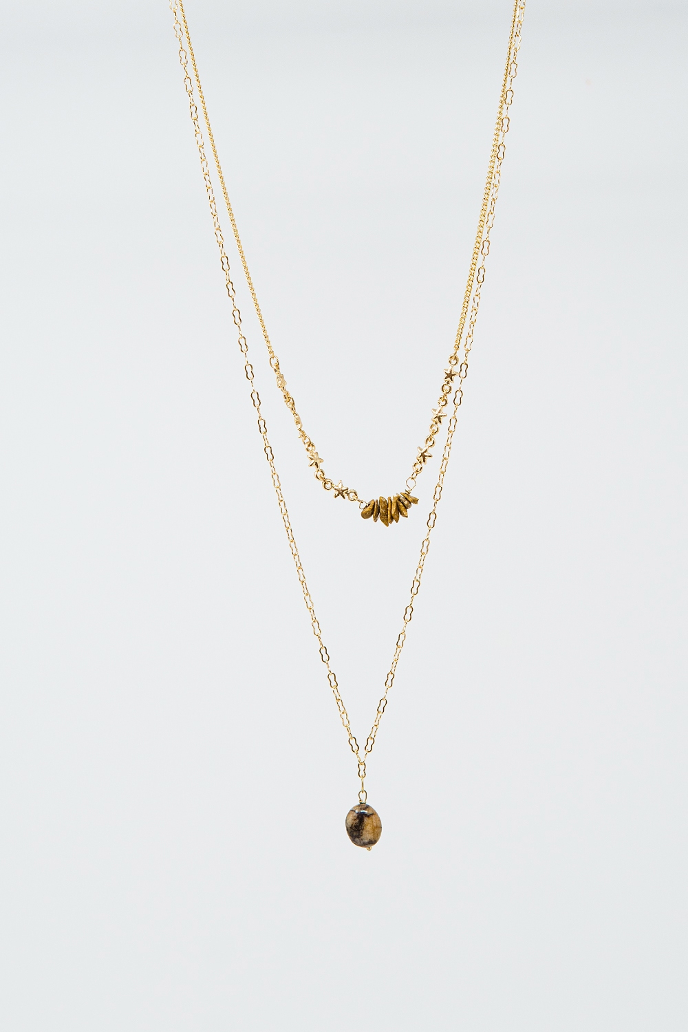 Collar 2 en 1 con colgante de piedra y detalles de estrella